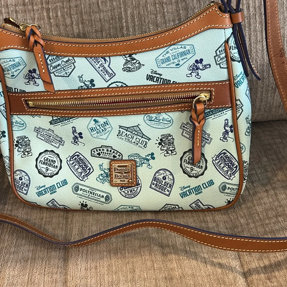 Dooney & Bourke Disney Vacation Club exclusive bag turquoise trimmed in rawhide - Picture 2 of 11